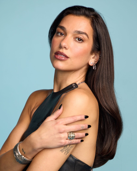 Closeup shot of Dua Lipa with glossy espresso hair